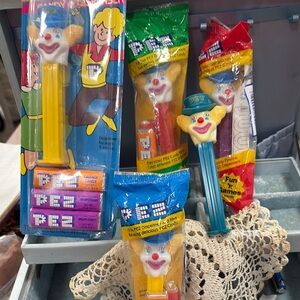 PEZ Clown Dispensers with Candy 5 total.
R